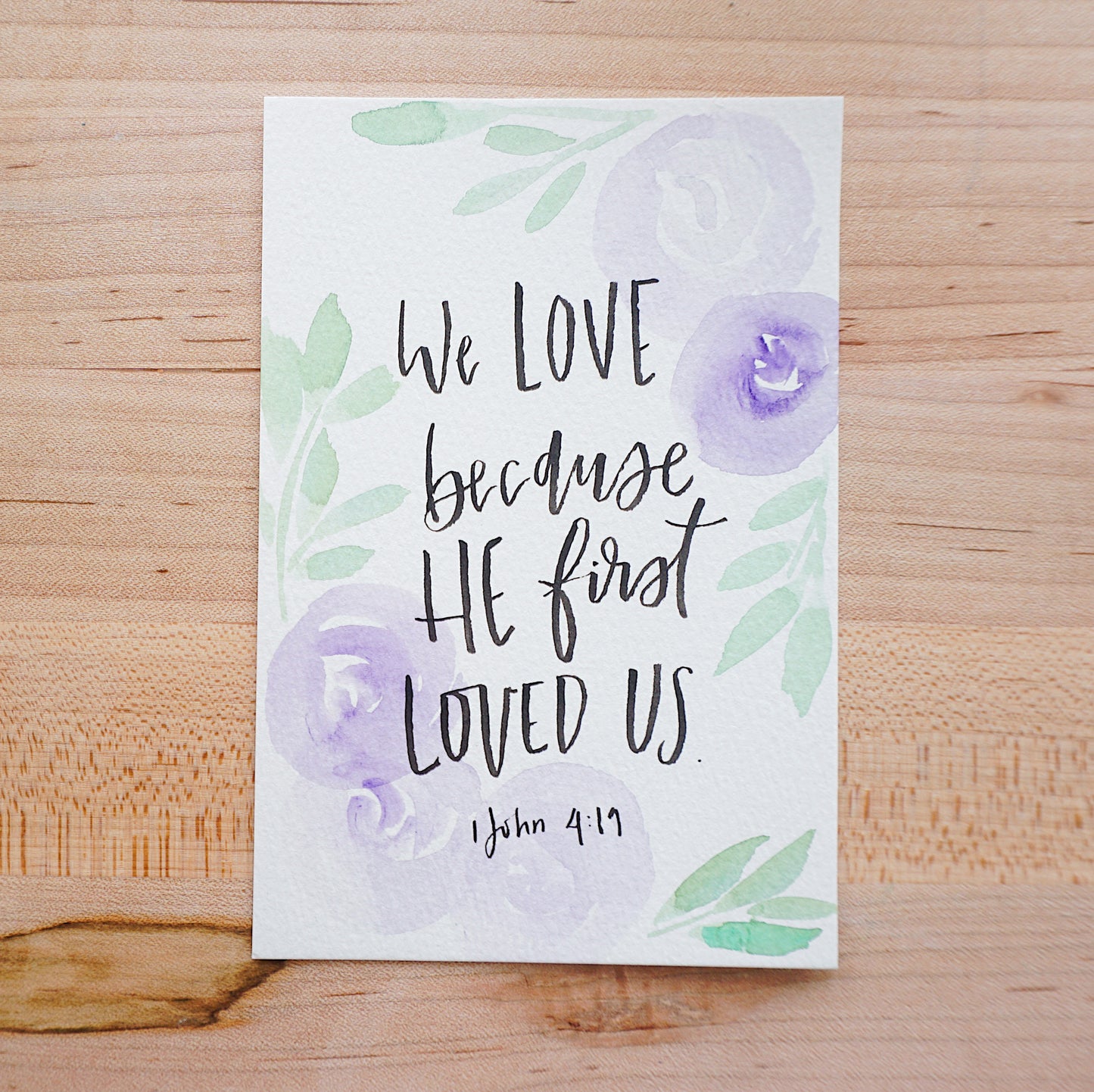 We love because He first loved us. (1 John 4:19) - Postcard