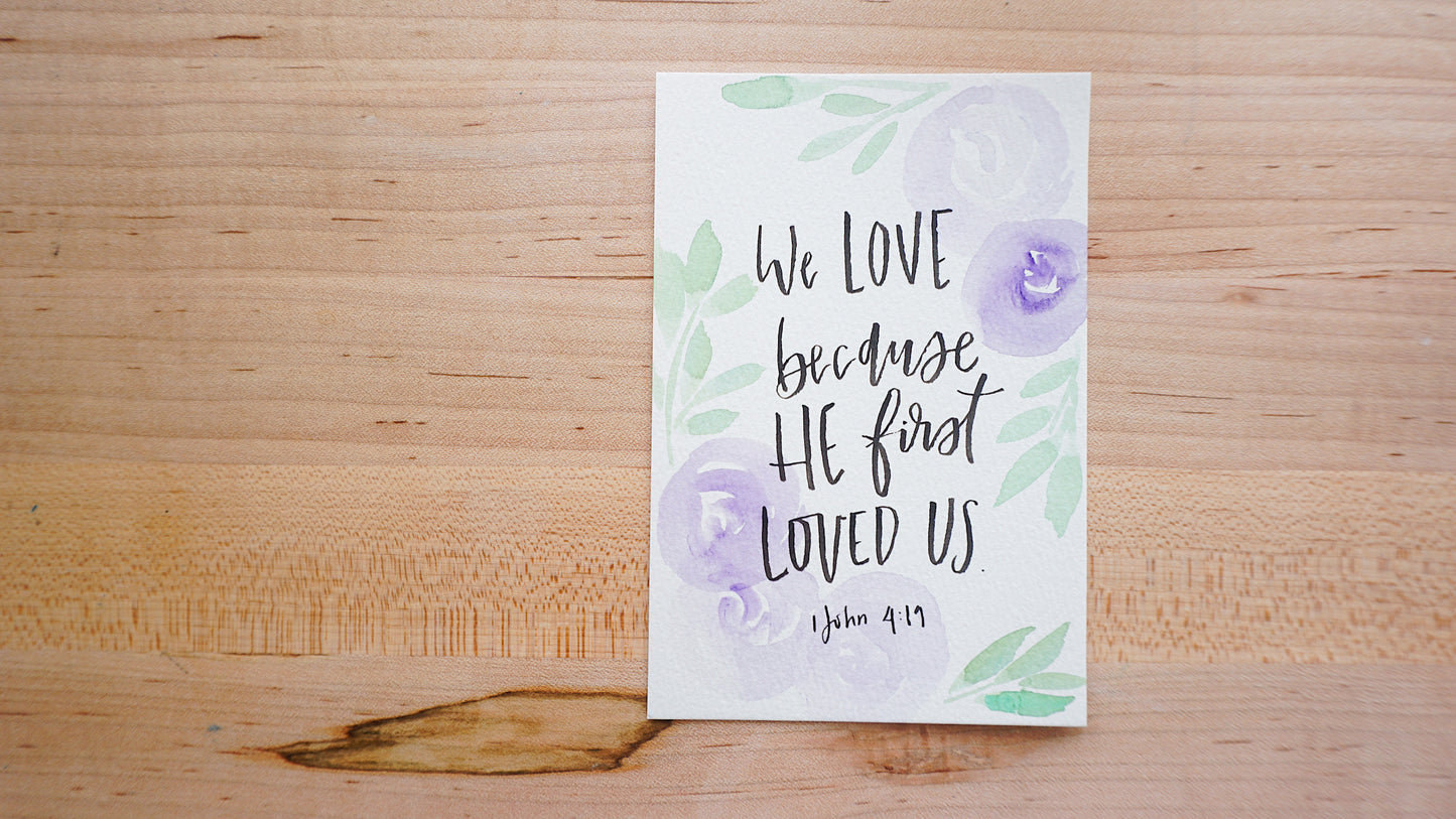 We love because He first loved us. (1 John 4:19) - Postcard