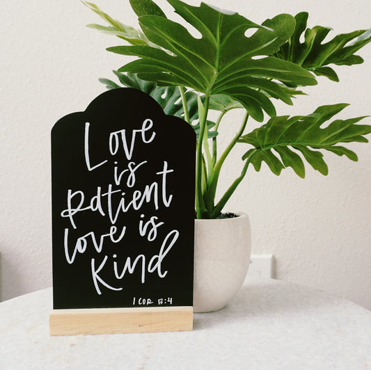 Love Is Patient Love Is Kind (1 Cor 13:4) - Tabletop Chalkboard Sign with Base - Light Color Wood